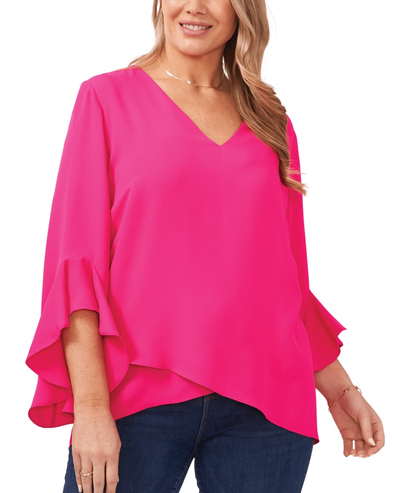 Front of a model wearing a size 1X Natalie Flutter Sleeve Tunic in HOT PINK by Vince Camuto. | dia_product_style_image_id:260992
